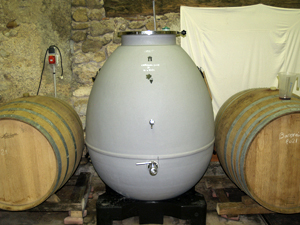 Clément explains the different types of barrels and vats used for ageing the wines 