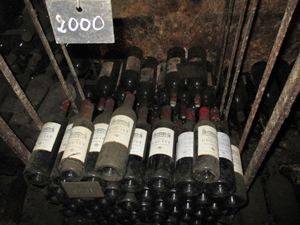 Visiting the private cellar containing the old vintage bottles. 