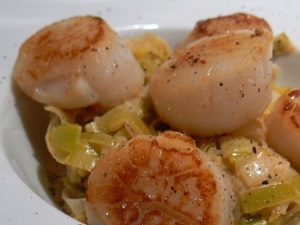 St Jacques scallops on a bed of leak purée