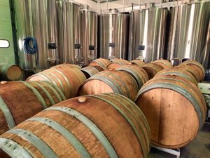 The vats and barrels used in the fermentation hall 